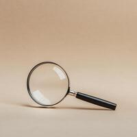 magnifying glass on beige background, showcasing minimalistic design and clarity photo