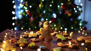Gingerbread man in a mask on a table among cookies video