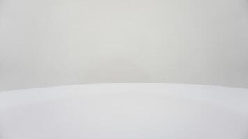 A white table with a white surface photo
