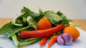 A white plate with vegetables photo