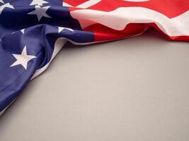 Part of the American flag is on a gray background with copy space for text photo