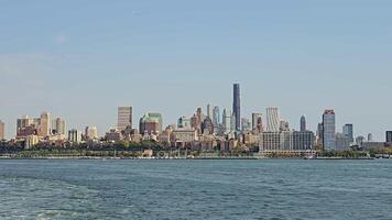 Brooklyn skyline seen from the water, modern and historic architecture under a clear sky video
