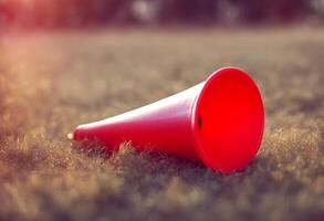 white red blower horn rolled noisemaker festive plastic party olated noise photo