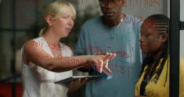 A woman pointing to a whiteboard video