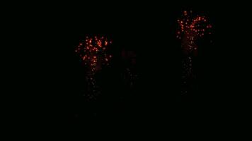 Sparkling Skyward. Capture the vibrant trail of three fireworks shooting across an ink-colored canvas at night, creating a spectacle of light and celebration. video