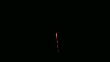 Fiery heart in the night sky. A mesmerizing display of fireworks forms a fiery heart against the backdrop of a dark, starlit night, symbolizing love, passion, and celebration. video