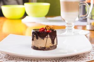 Round mini chocolate souffle cake close up photo