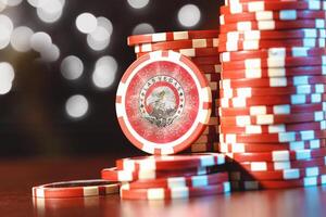 Poker chips stacks on bokeh light background photo