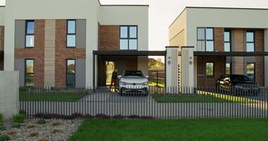 A modern house with a car parked in front of it video