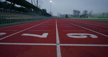 A running track with numbers painted on it video