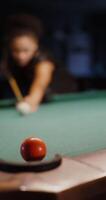 A pool table with a ball on it video