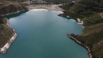 Aerial view of a lake in the mountains video
