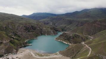 An aerial view of a lake in the mountains video