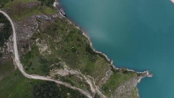 An aerial view of a lake and a road video