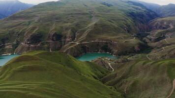 A view of a lake and mountains from above video