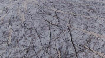 A large rock with a lot of cracks and cracks video