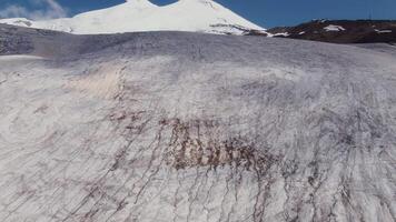 An aerial view of a glacier with snow on it video