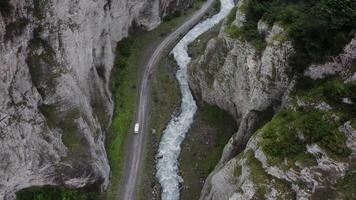 Aerial view of a road winding through a canyon video