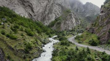 A river runs through a canyon in the mountains video