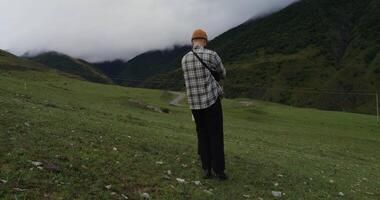 A man standing in the middle of a field video