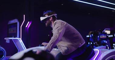 A man in a vr headset riding a motorcycle video