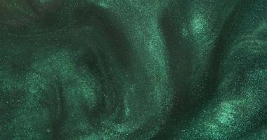A close up of a green liquid with a swirl video