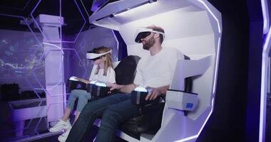 Two people in a virtual reality experience video