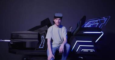 A man sitting on a chair with a headset on video
