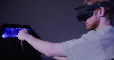 A man wearing a vr headset is driving a car video