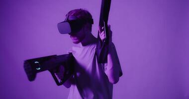 A man wearing a virtual reality headset holding a gun video