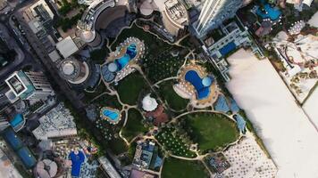 An aerial view of a large pool and a beach video