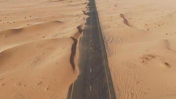 An aerial view of a desert road in the middle of the desert video