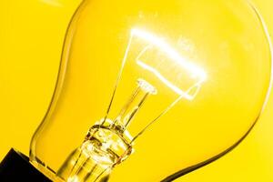 Close up of an illuminated light bulb photo