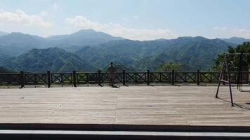 Experience the breathtaking and spiring mountain view from a scenic overlook point. Media video