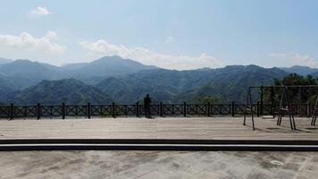 Enjoy the stunning scenic mountain view while also taking pleasure in the nearby playground. Media video