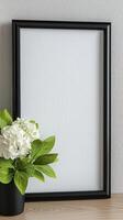 Mock up photo frame with white hydrangea on wooden table 3d rendering