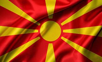 Macedonia national flag with realistic fabric texture and smooth folds waving in the wind. photo