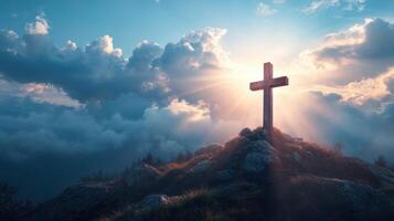 Stone Cross Stands on Hill. Bright Sun Shines Through Clouds. Religious Symbolism. Easter Image. Faith Concept. Church Background. Beautiful Sky. Light Rays. Top of Mountain. photo