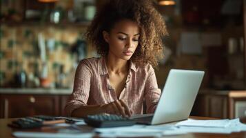 Woman at desk works on computer. Person with papers uses calculator for work. Finance and business concept with technology. Focus on screen. photo