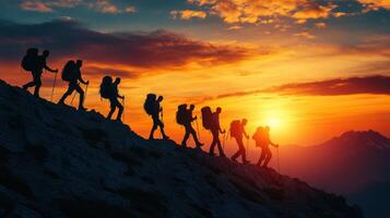 Team Climbing on sunset. Hikers Silhouette. Group Walking Mountain. People with Backpacks Hike at Sunset. Adventure and Travel in Nature. photo