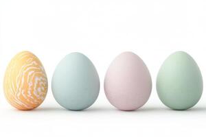 Contemporary design of Easter eggs isolated on white background showcasing a variety of pastel colors and marble pattern photo