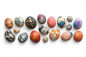 Various Easter eggs folk motif isolated on white background displaying a variety of colors, patterns, and designs, reflecting traditional craftsmanship and festive spirit photo