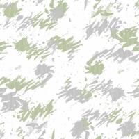 A green and white camouflage pattern vector