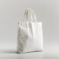 White canvas tote bag on table, with silver facial tissue holder photo