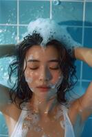 a woman is taking a bath with foam on her face photo