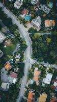 Aerial View of Residential Area with Roads and Greenery photo