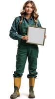Woman in green outerwear and yellow boots holds frame, smiling photo