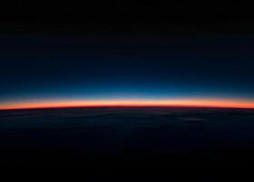 Beautiful Horizon of the Earth from Space at Twilight photo