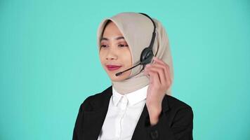 Young Female Customer Service in a hijab Representative Agent Smiling video