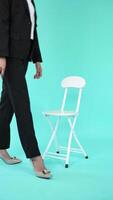 Portrait of Young Woman in a hijab Posing with Chair video